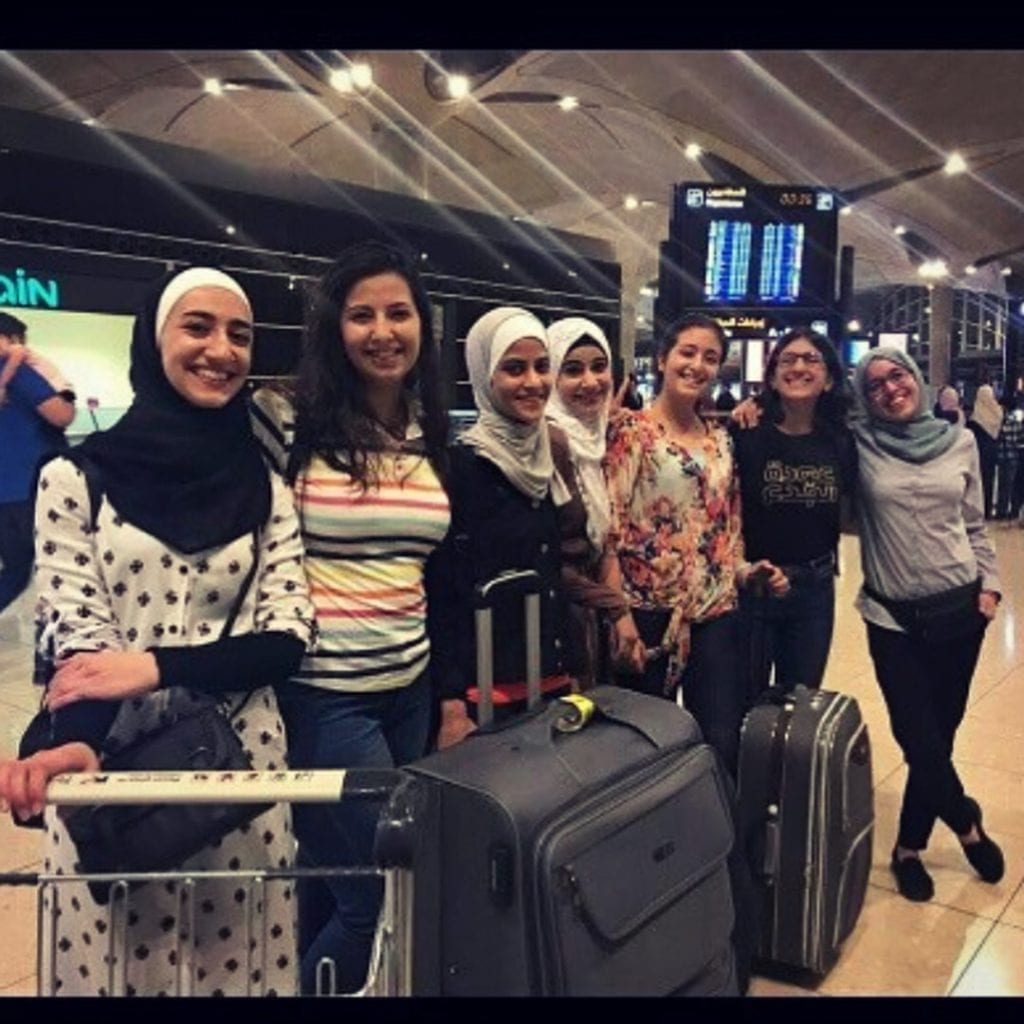 Tech Girls arriving at airport