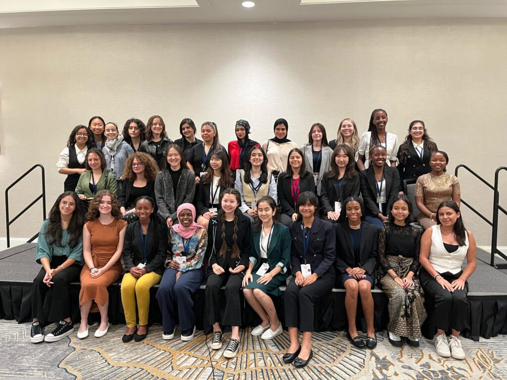 A group of TechGirls posing together at the Capstone event
