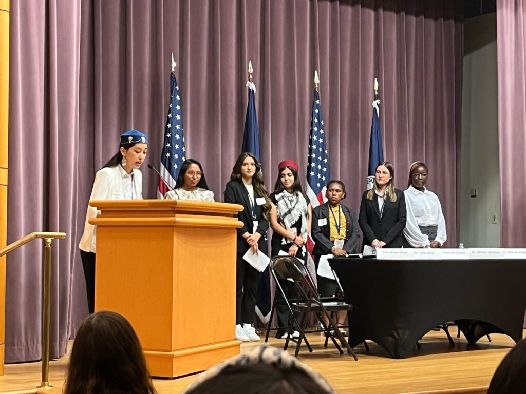 Kuralay from Kazakhstan gives her speech as her fellow TechGirls speakers look on