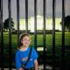 TechGirl alumna Medine smiling in front of the White House.